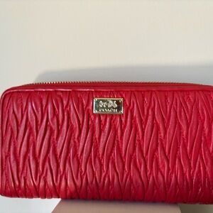 Coach “Mad Twist” leather full wallet